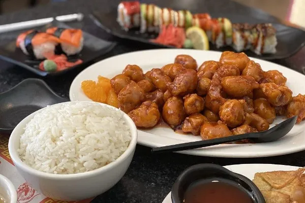 Vegan orange chick’n with rice and sushi served on the Chinatown Vegan Food Tour in Las Vegas
