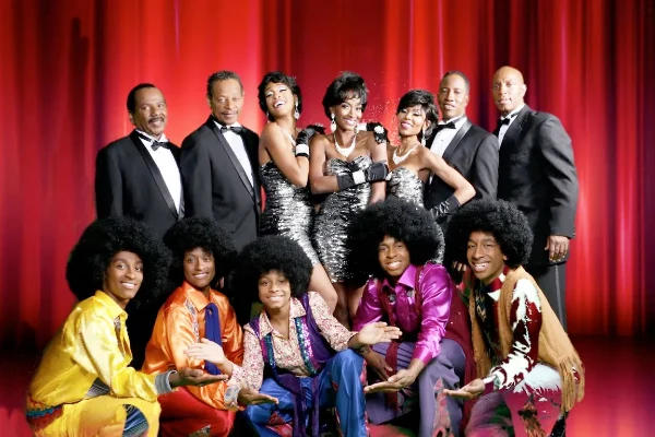 Motown Extreme Las Vegas cast posing in coordinated tribute costumes