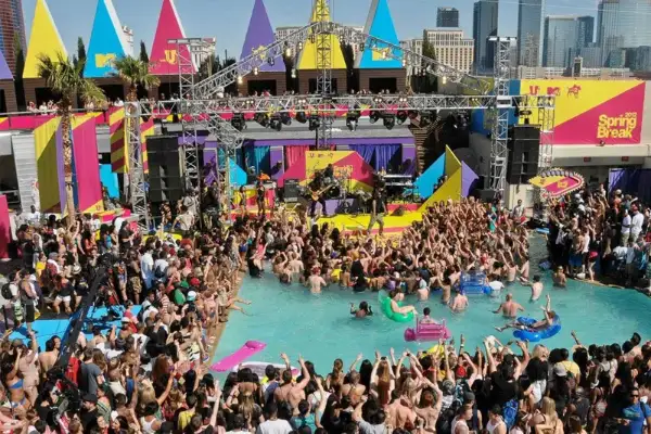 Palms Pool Dayclub Las Vegas resort pool party with cabanas palm trees and daytime music