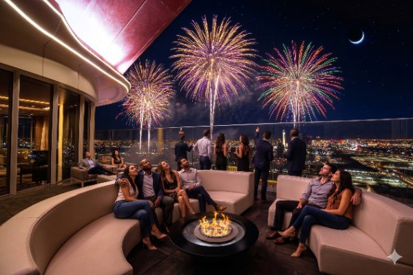 Guest at the Legacy Club at Circa Las Vegas enjoy watching a free fireworks show light up the sky.
