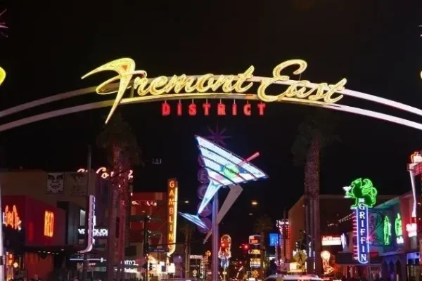 Turnt Up Tours Fremont Street Pub Crawl guests celebrating during a Downtown Las Vegas bar crawl