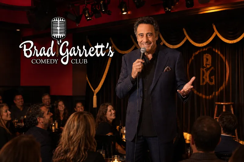 Brad Garrett performs for a laughing audience inside his intimate red, black, and gold Las Vegas comedy club.