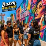 Guests explore colorful murals and local landmarks on a Buzzy Vegas Tours guided walking tour through Downtown Las Vegas and the Arts District.