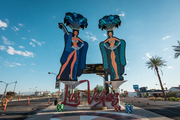 Two illuminated 50-foot showgirls framing the Downtown Las Vegas Gateway Sign