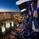 Riders on the virtual reality attraction Fly Over Las Vegas.