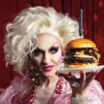 Hamburger Mary’s drag performer holding a hamburger.