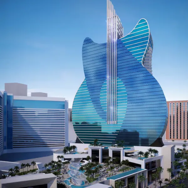 Architectural rendering of the iconic blue glass guitar-shaped hotel tower at Hard Rock Las Vegas, showcasing the luxurious pool deck, palm trees, and modern resort facade under a clear sky.