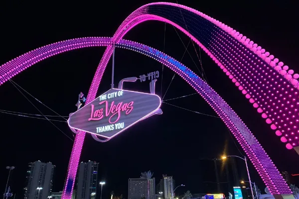 Las Vegas Gateway Arches glowing pink near The STRAT on Las Vegas Boulevard