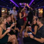 Friends on a Las Vegas pub crawl party bus.