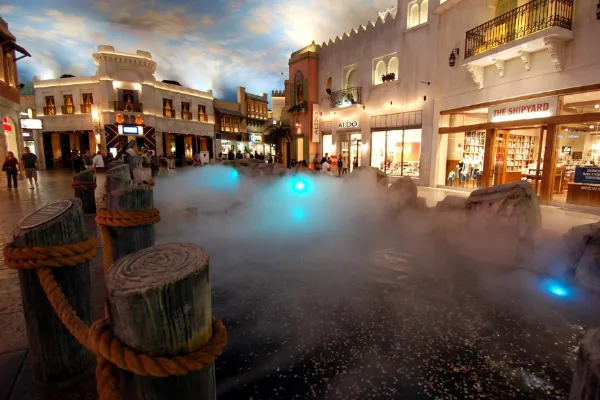 Indoor Rain Show with water, fog, and theatrical lighting at Miracle Mile Shops in Las Vegas