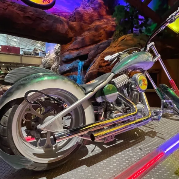 A camouflage and green Orange County Chopper on display at the Silverton Casino sits outside the entrance to the Bass Pro Shops store.