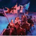 Tournament of Kings knights performing in the arena.
