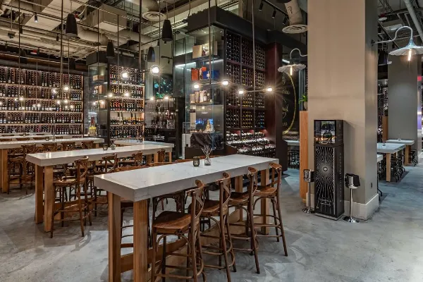 Wine bar and bottle displays at Wally’s in Resorts World Las Vegas