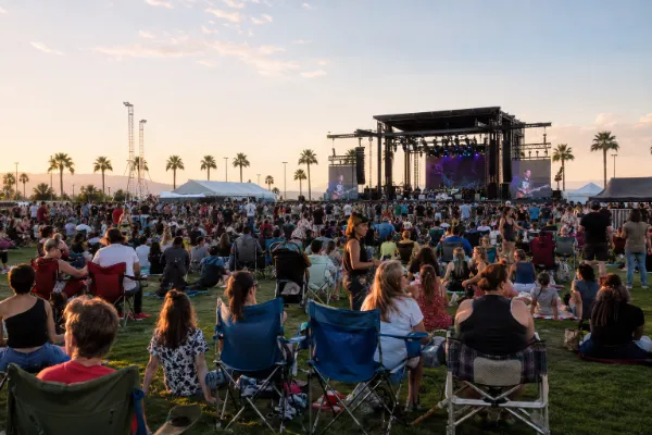 Crowd attending an outdoor festival on the grass event field at Desert Breeze Event Center in Las Vegas.