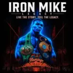 Mike Tyson wearing championship belts above the Flamingo Las Vegas in an Iron Mike Legacy experience poster.