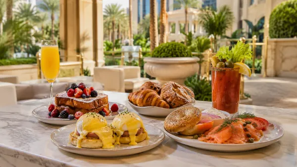 Eggs Benedict, French toast, smoked salmon, pastries, and brunch cocktails on an upscale Las Vegas terrace