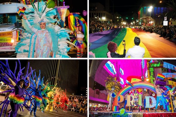 Illuminated floats and participants marching in the Las Vegas PRIDE Night Parade.