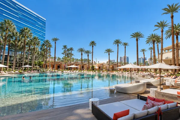 Resort pool and shaded cabanas at Virgin Hotels Las Vegas.