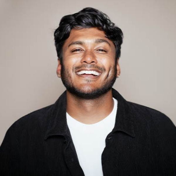 Comedian Usama Siddiquee smiling ahead of his Las Vegas stand-up show