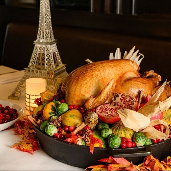 Thanksgiving turkey dinner with autumn vegetables and Eiffel Tower decoration at Mon Ami Gabi Las Vegas