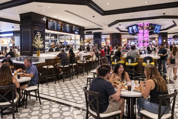 Fulton Street Food Hall at Harrah’s Las Vegas with quick-service counters and casual dining seating